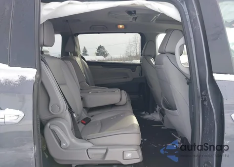 2021 Honda Odyssey Elite z USA, uszkodzony, nr VIN 5FNRL6H92MB011917